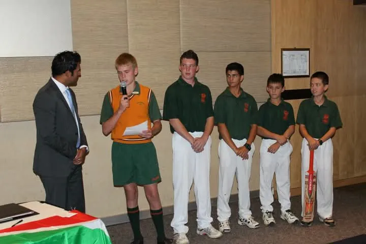 Young cricketers presenting at a Right 2 Learn community event